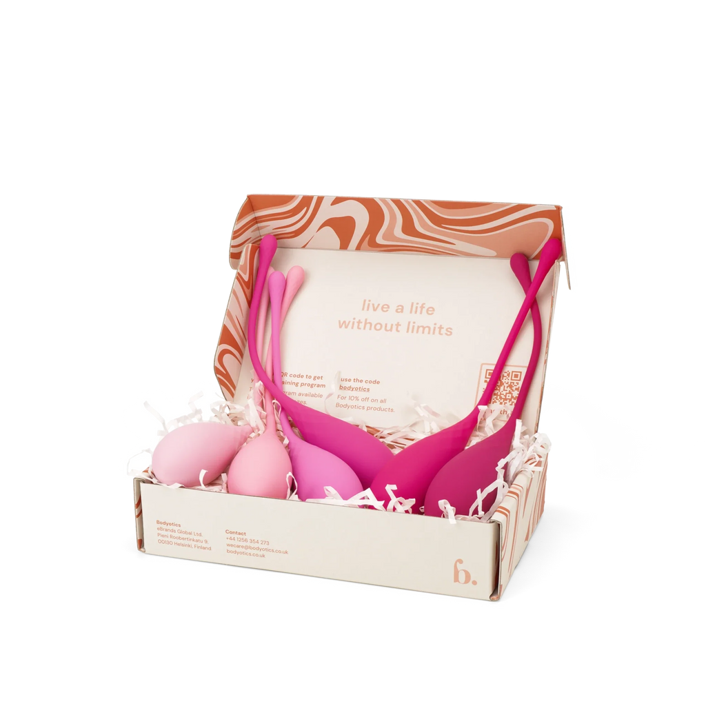 Bodyotics Kegel balls set with six graduated pelvic wellness weights in pink shades, packaged in a decorative box.