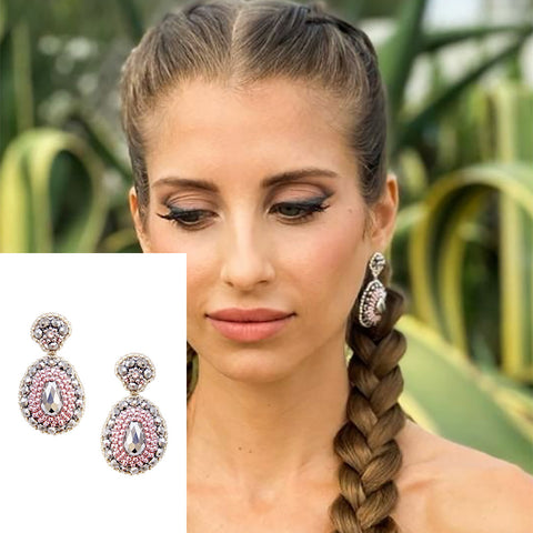 Cathy Hummels wearing drops of rose natural MASCHALINA statement earrings in silver and pink
