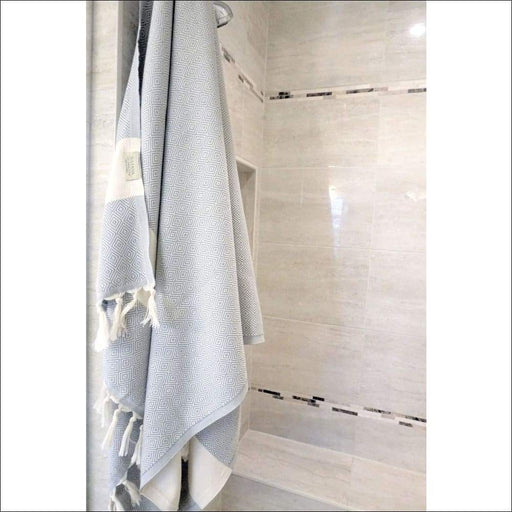 https://cdn.shopify.com/s/files/1/0357/0558/5796/products/eco-friendly-peshtemal-turkish-bath-towel-towels-interior-design-white-novarian-creations-nova-901_512x512.jpg?v=1651927643