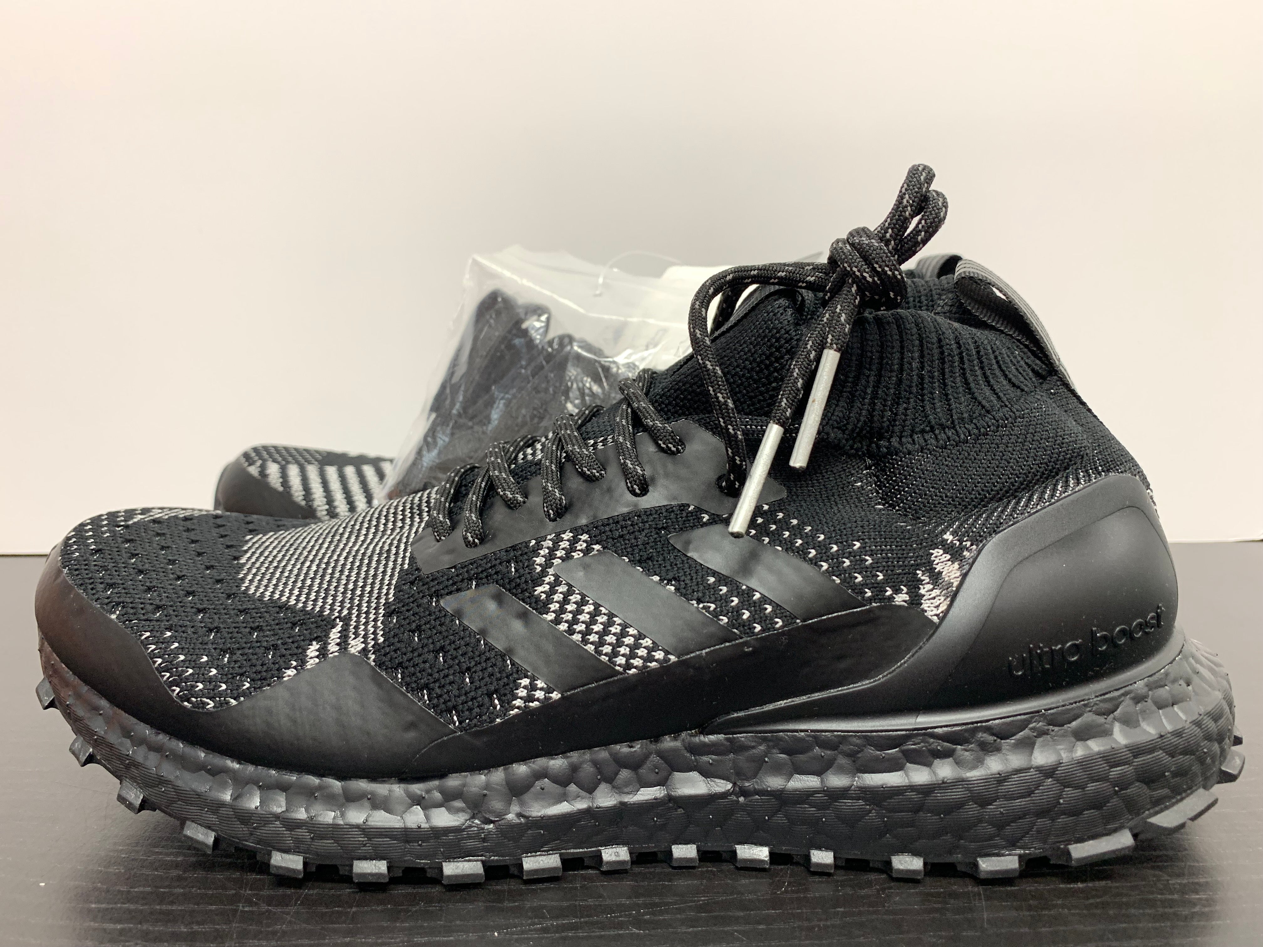 kith nonnative ultra boost mid