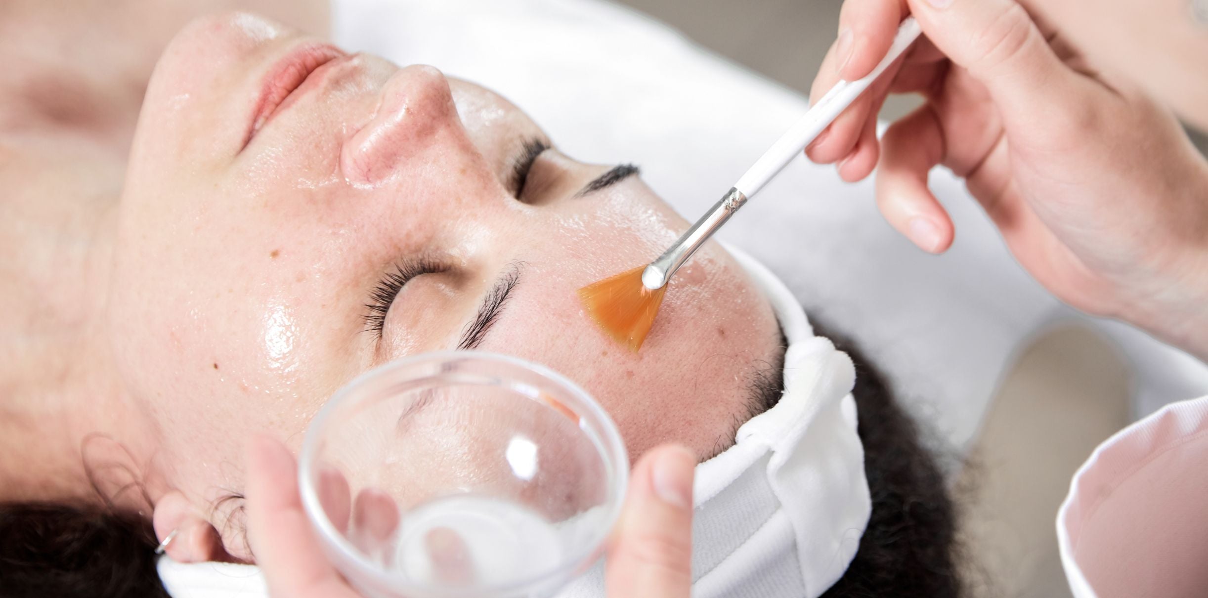 Woman getting a chemical peel treatment