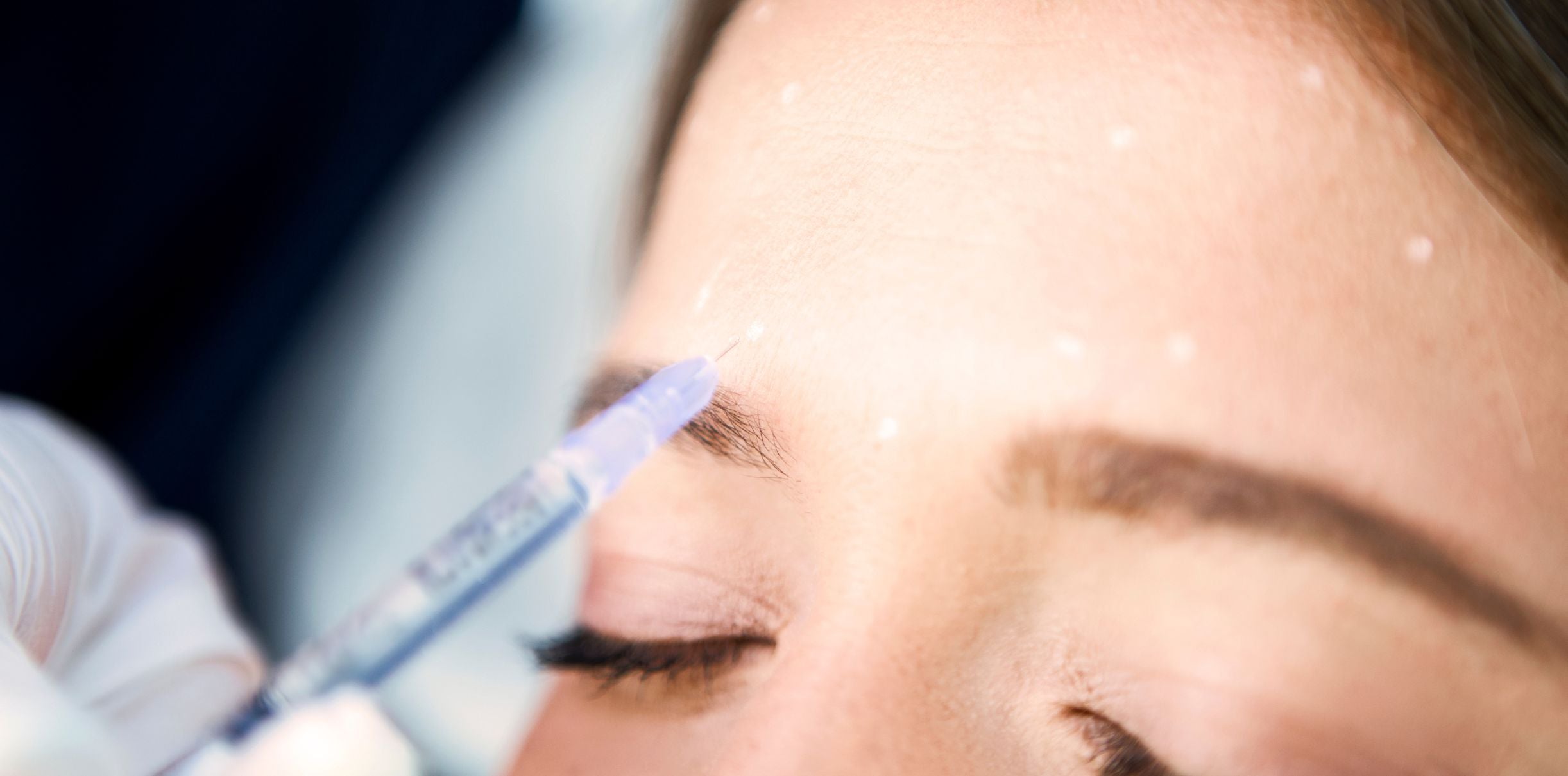 woman getting an injectable treatment