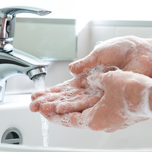 person washing hands