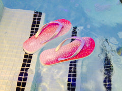 flopz-flip-flops-pink-siam-silver-straps-floating-in-spa-pool-london.jpg