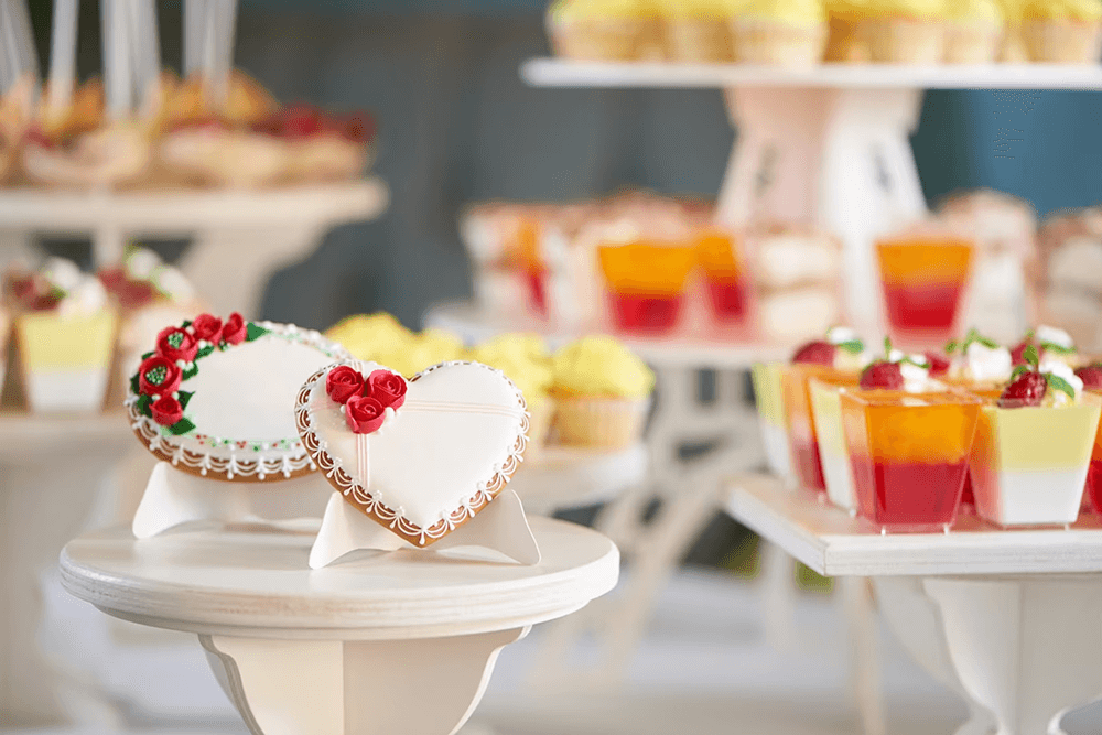 unique dessert on white cupcake stands