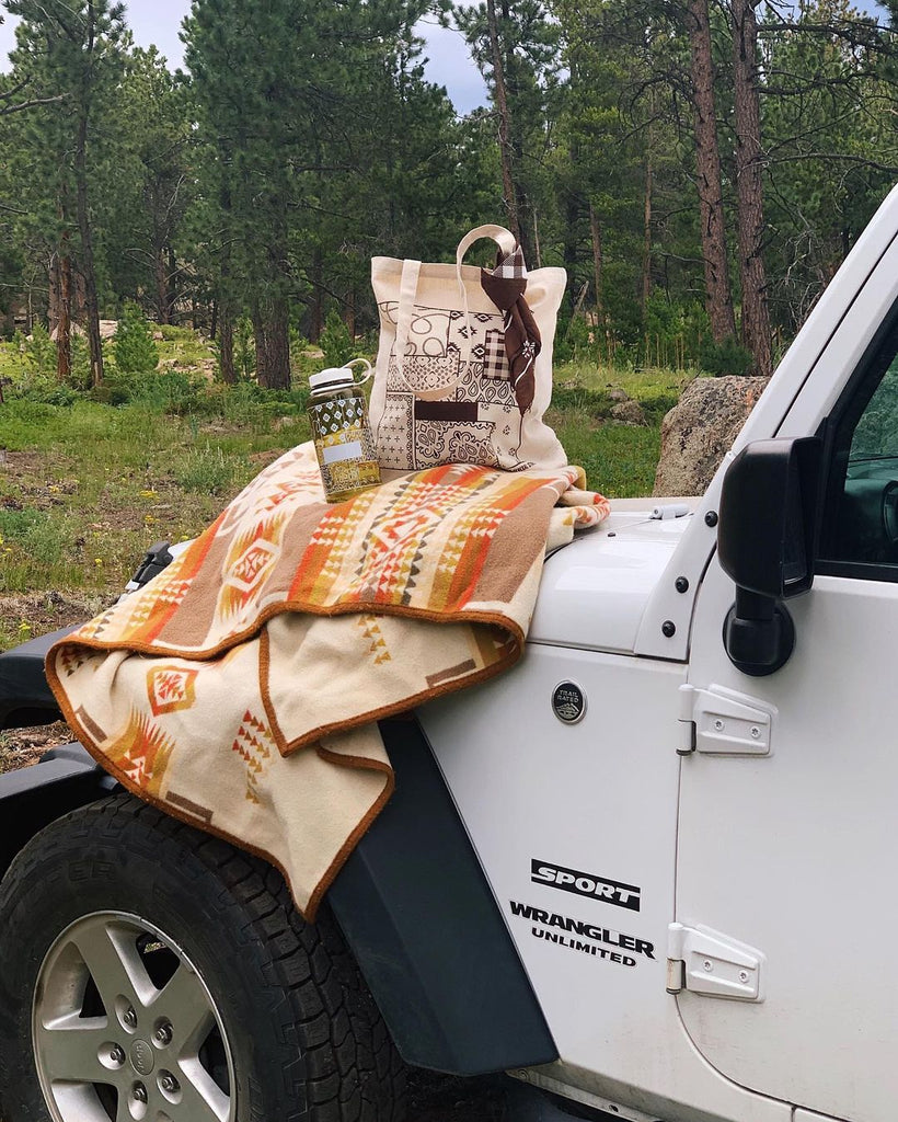 Our summer shop goods sitting on the hood of Court's Jeep