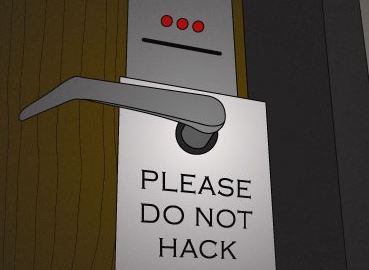 onity door lock with please do not hack sign hung on door