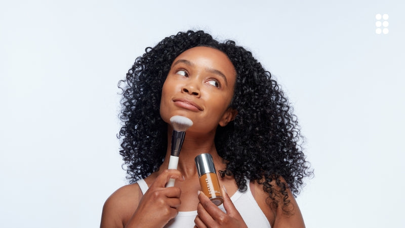 Lady with DCYPHER Foundation and Buffer Brush