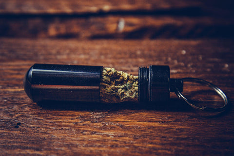 Black weed bullet on keychain used to hide marijuana.