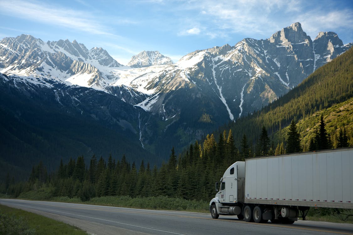 Truck on highway in mountains