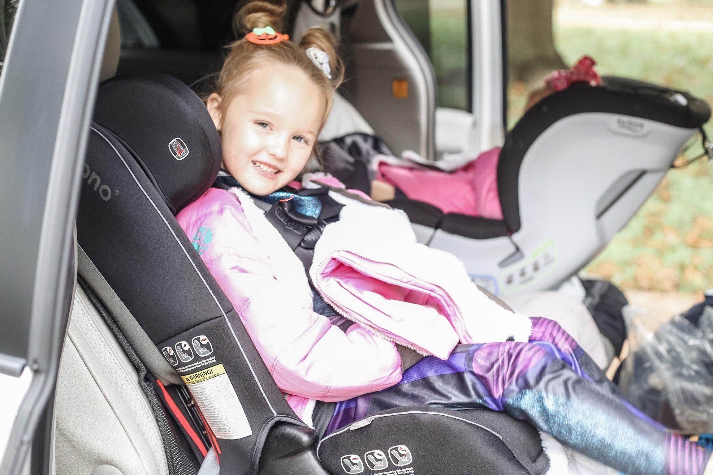 can infant car seat be in the middle