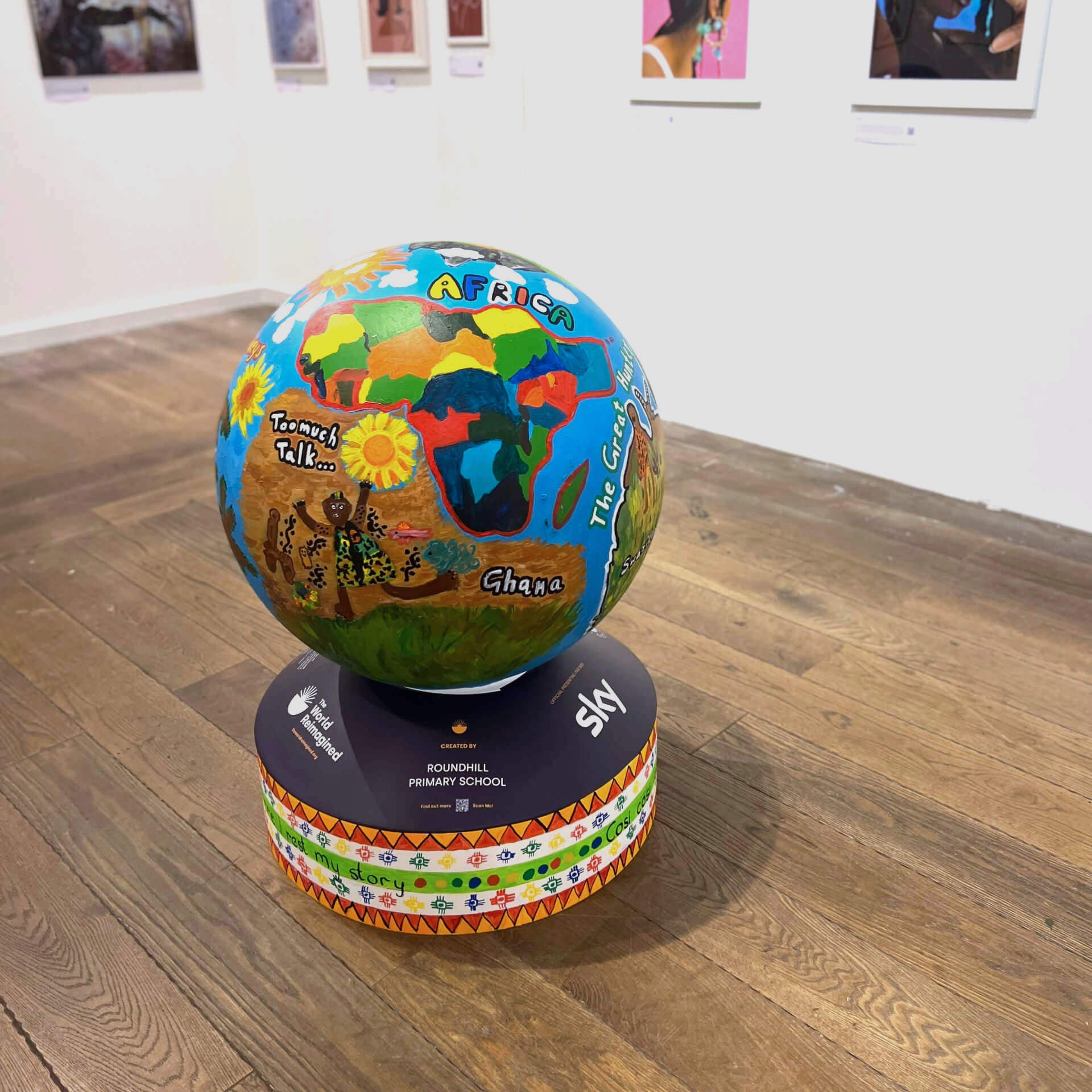 painted globe of the world with a focus on celebrating Africa