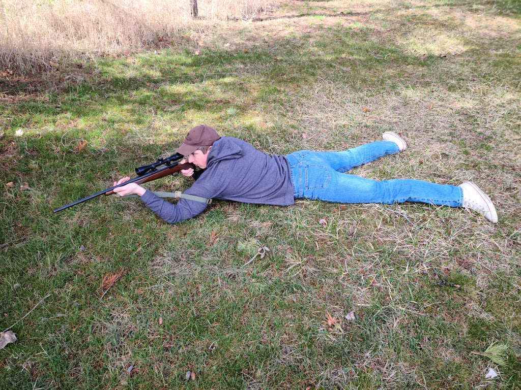 A prone shooting position with a green nylon webbing RS-2 Rifleman's Essential Sling 