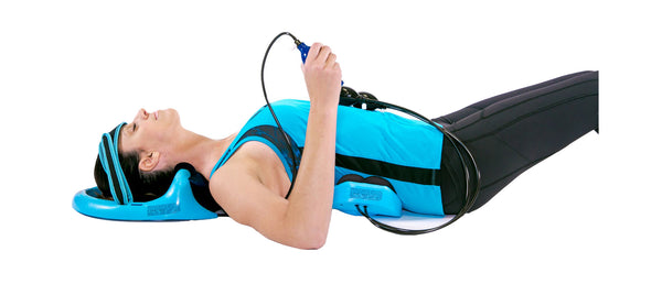Woman using the Posture Pump® Deluxe Full Spine (Model 4100-S)