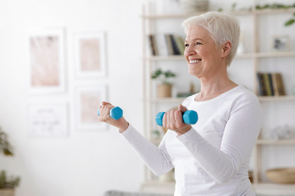 Older woman exercising indoors