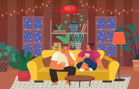 Couple on living room couch during winter