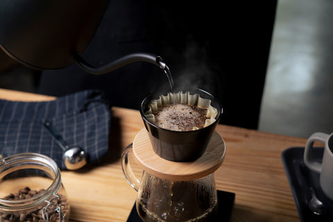 Coffee Being Poured Through A Drip Filter