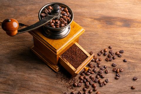 Manual Coffee Grinder With Collection Box Filled With Coffee