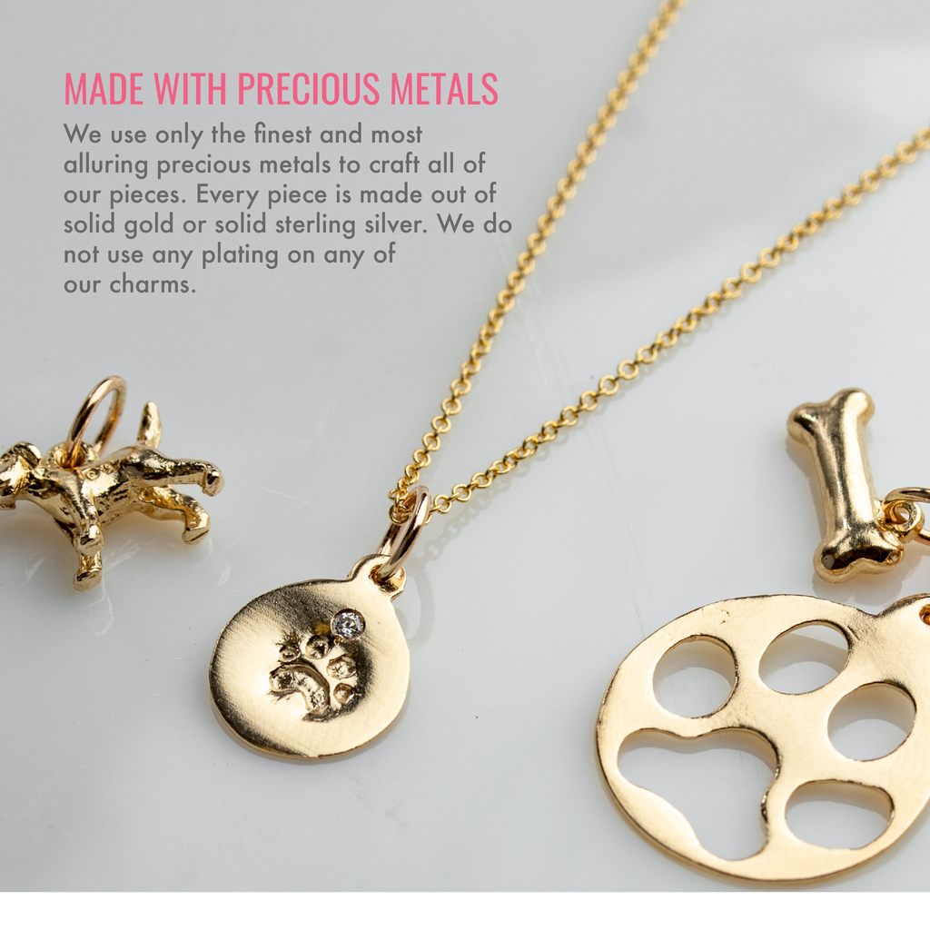 Made with precious metals. We use only the finest and most alluring precious metals to craft all of our pieces. Every piece is made out of solid gold or solid sterling silver. We do not use any plating on any of our charms.