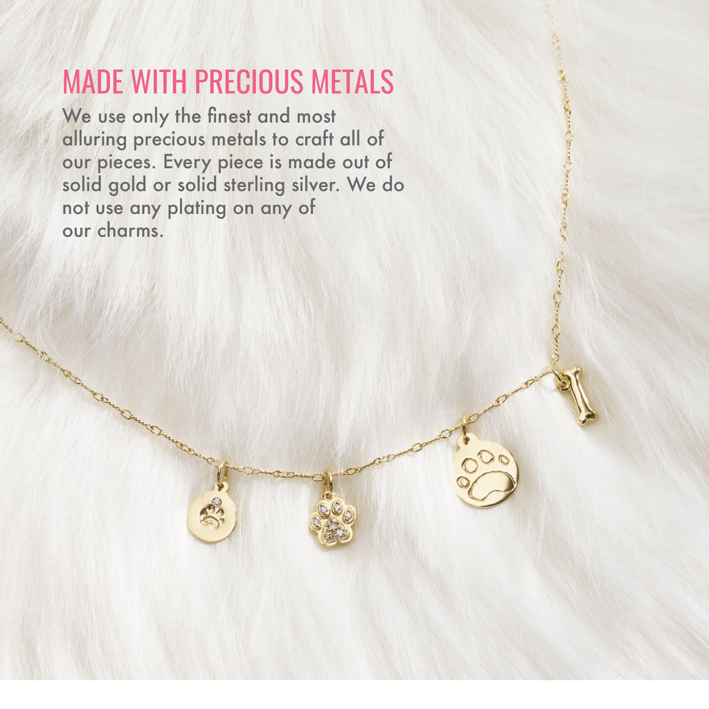 Made with precious metals. We use only the finest and most alluring precious metals to craft all of our pieces. Every piece is made out of solid gold or solid sterling silver. We do not use any plating on any of our charms.