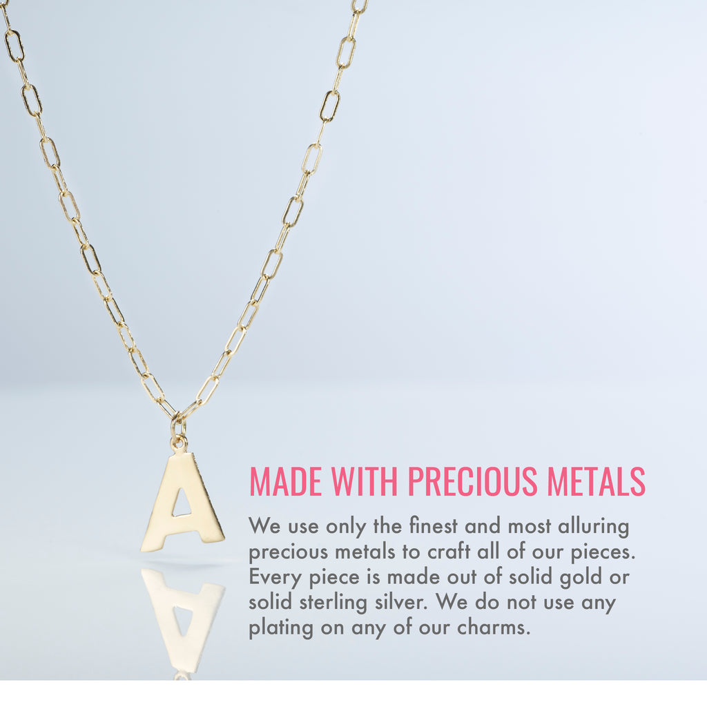 Made with precious metals. We use only the finest and most alluring precious metals to craft all of our pieces. Every piece is made out of solid gold or solid sterling silver. We do not use any plating on any of our charms.