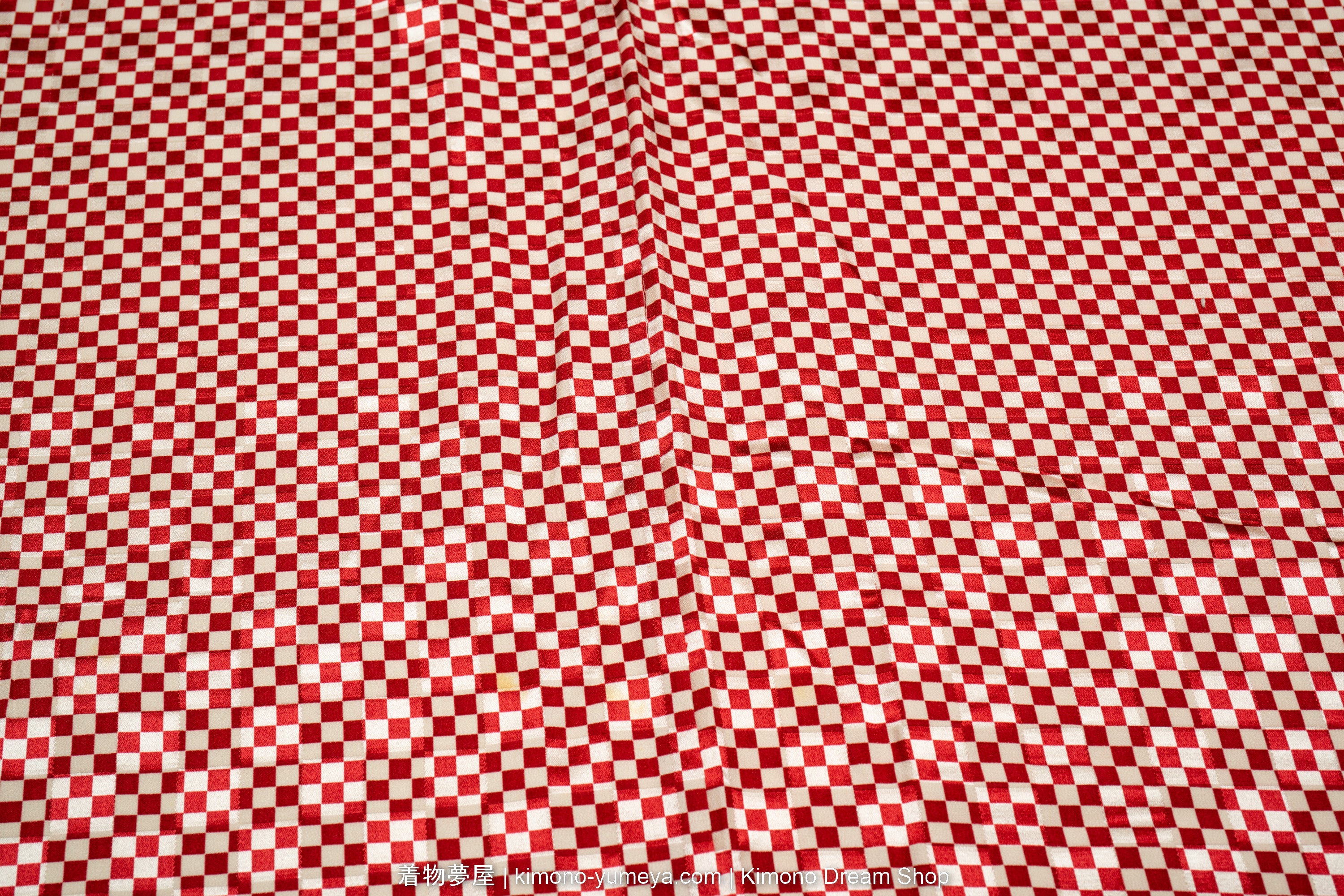 Red & white ishidatami pattern made out of very tiny squares.