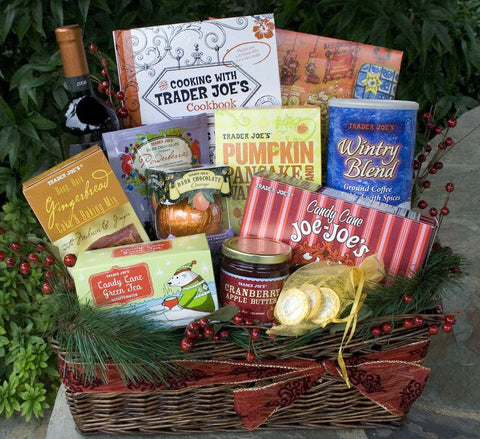 gift basket with greenery and boxes and containers of Trader Joe's products