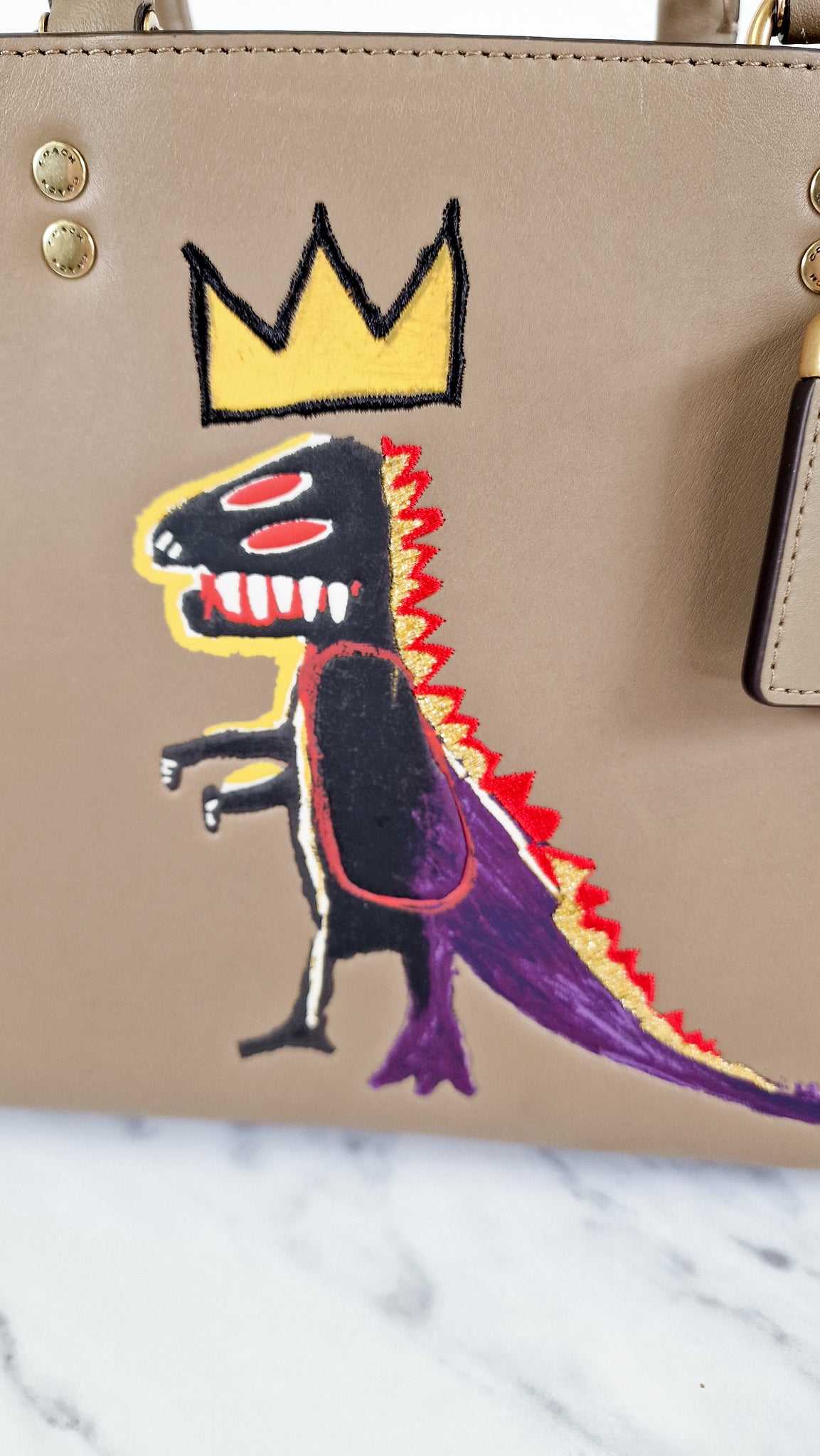 Coach x Jean-Michel Basquiat Rogue 25 Pez Dispenser Dinosaur Bag in El –  Essex Fashion House