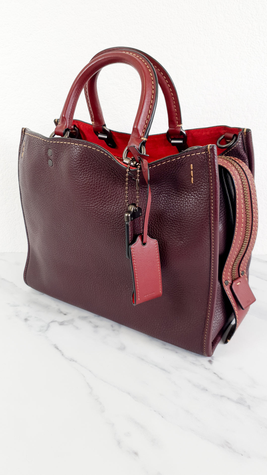 coach rogue 25 oxblood