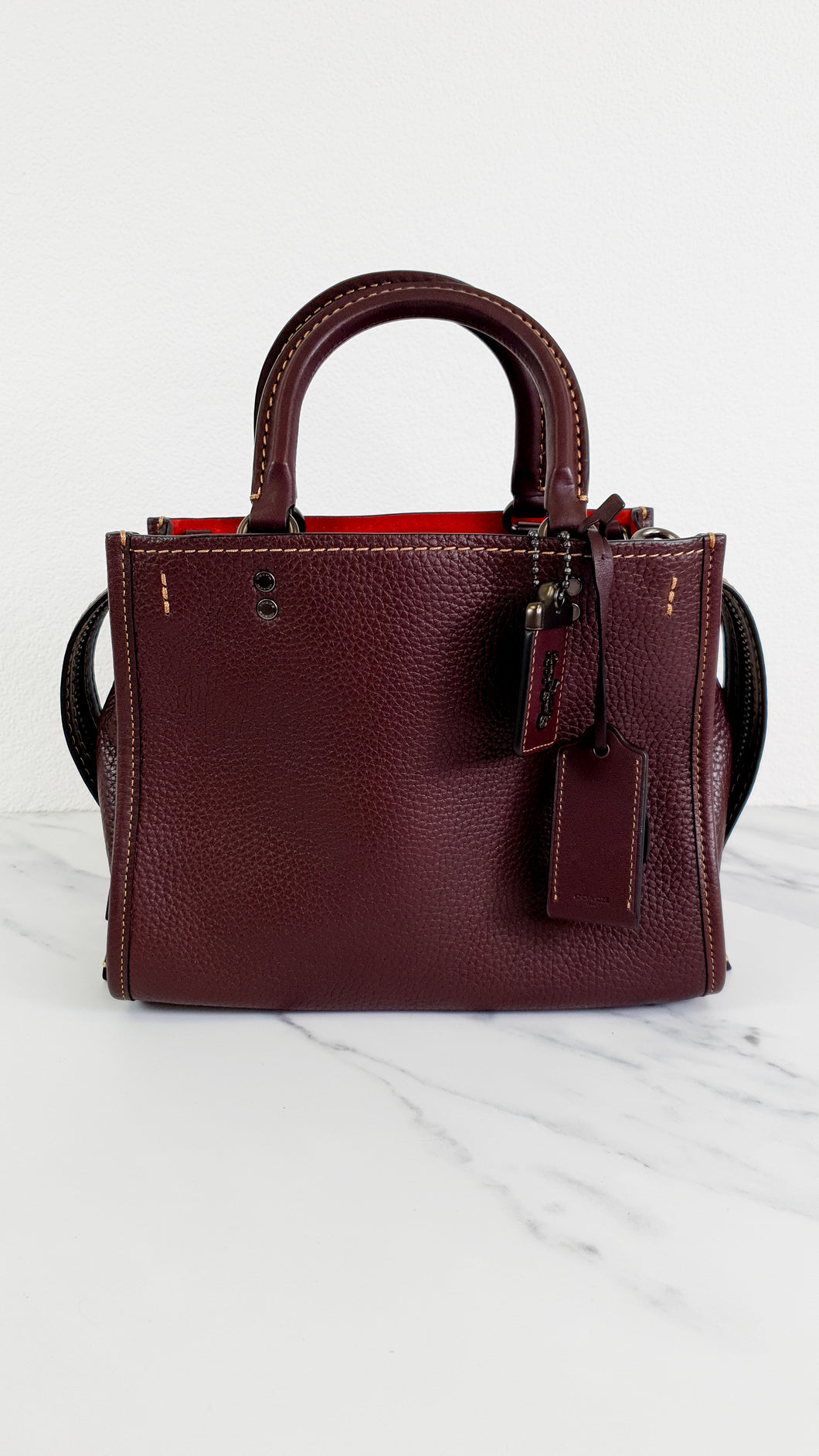 coach rogue bag oxblood