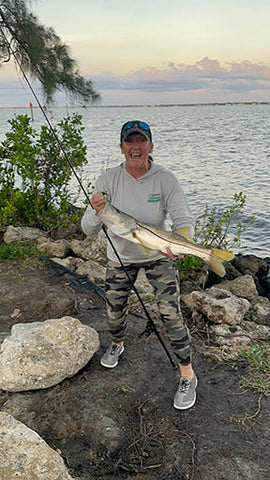 Reel Girlz Jenn Nolan Fishing Snook caught with PIVIT Trailer Jig on Florida coast