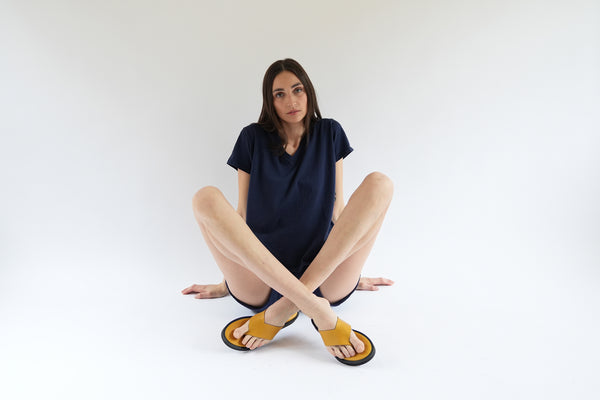 Mustard leather thong sandal and navy cotton knits