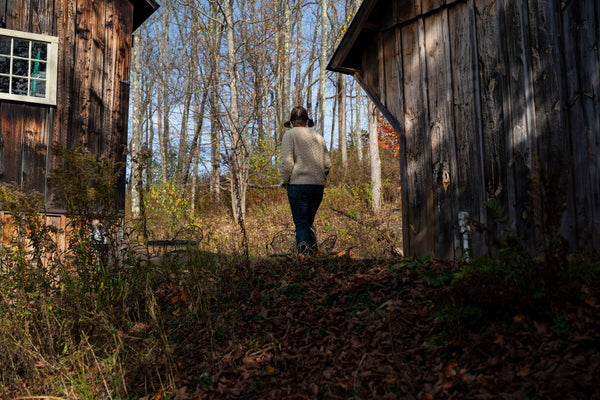 Lisa walks up to the barn, also known as lisa b. headquarters | lisa b.