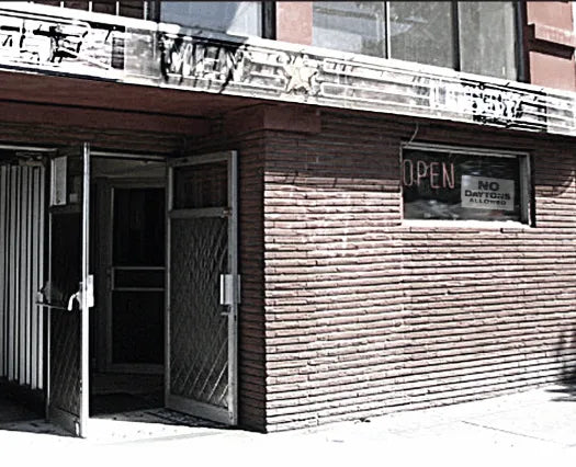 Historical Shot of the bar with No Daytons Allowed sign in the window.