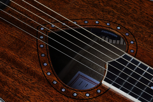 Sound hole with mother of pearl inlay and Fishman electronics