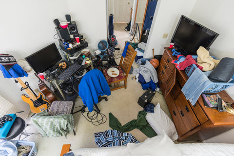 cluttered teenager bedroom