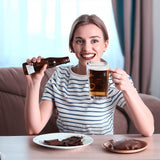 a woman beer and eating chocolate