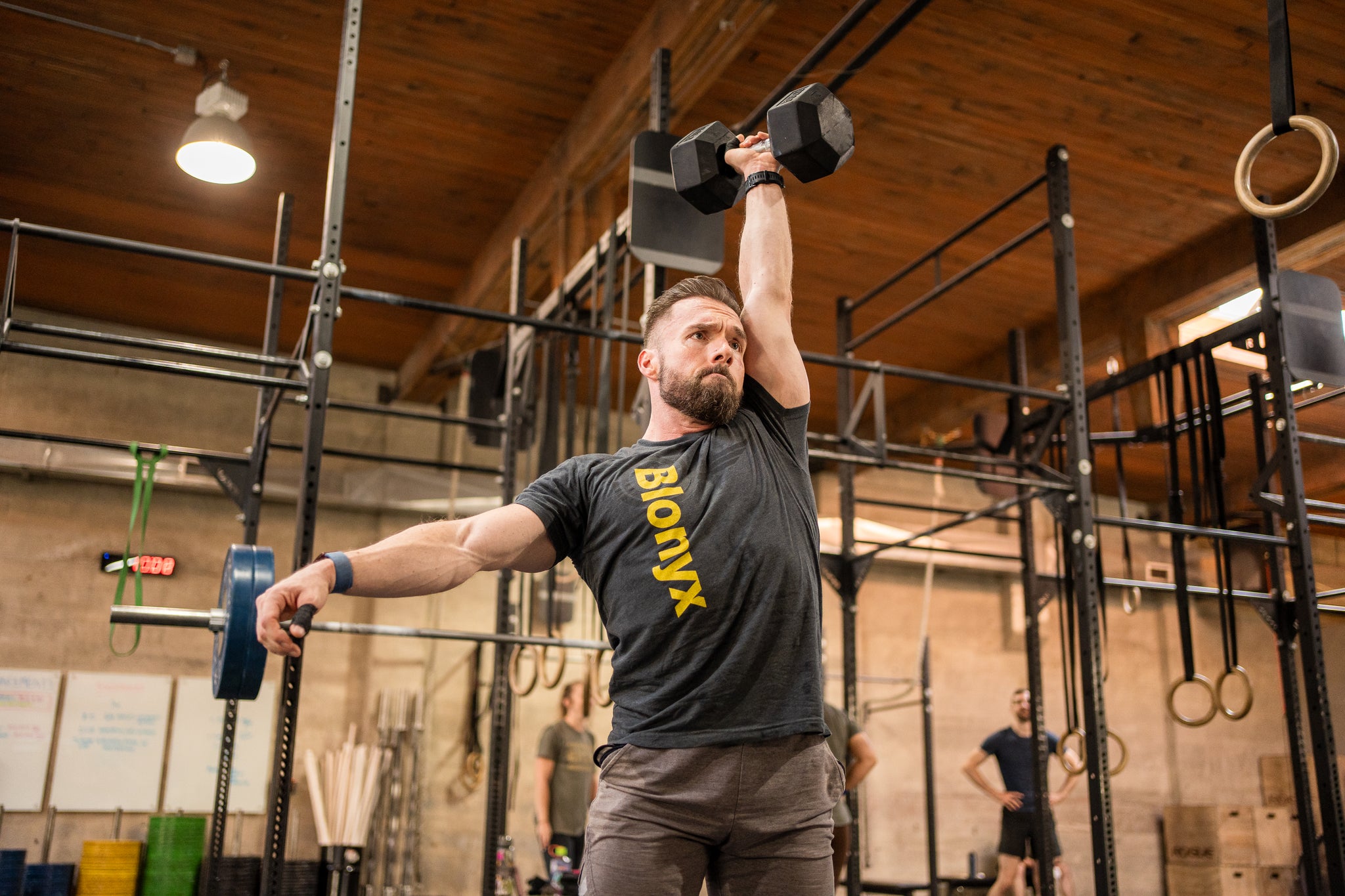 Man lifting a dumbbell above his head