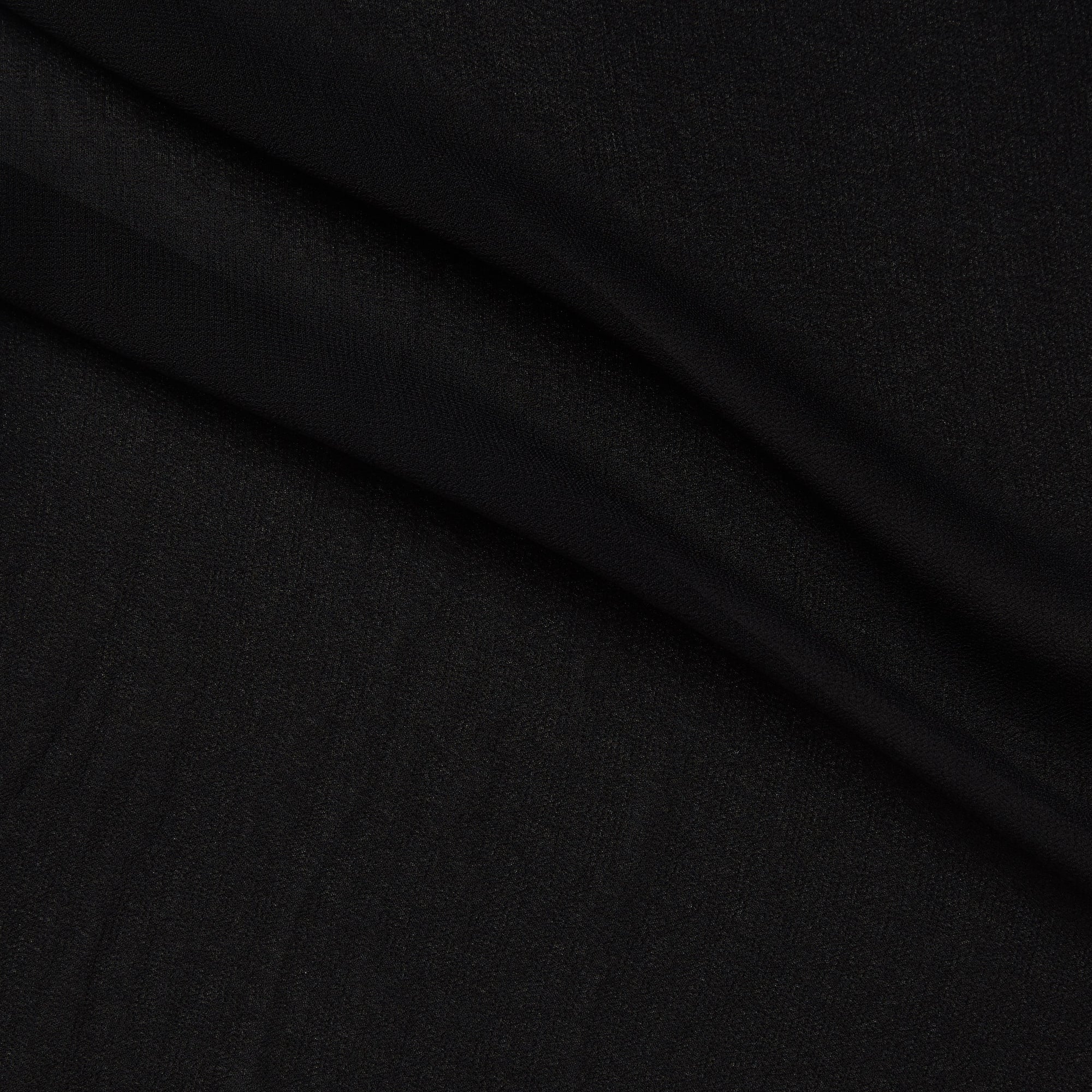 Chelsea black color version of a  double georgette pure viscose fabric with crinkled face and fluid drape