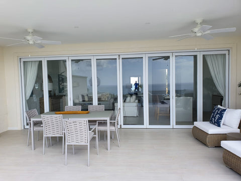 8 PANEL BIFOLD DOOR, WHITE FINISH WITH CLEAR GLASS