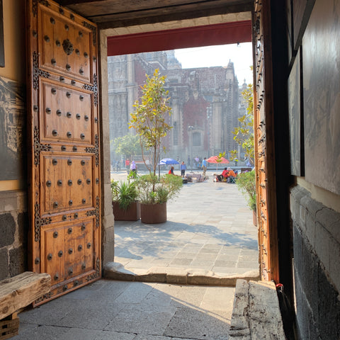 Looking through a wooden door in Mexico City