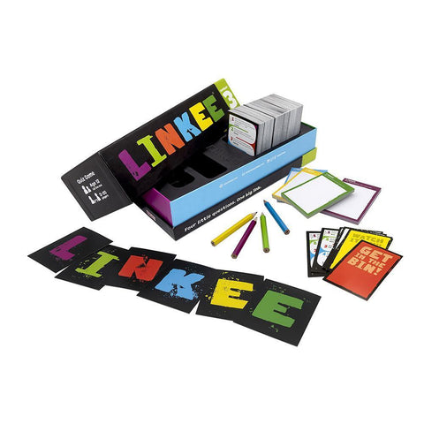 Inside of box showing the cards and pencils for the game Linkee from Ideal Games