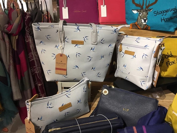 Photo of a selection of Brakeburn bags in the swallow print