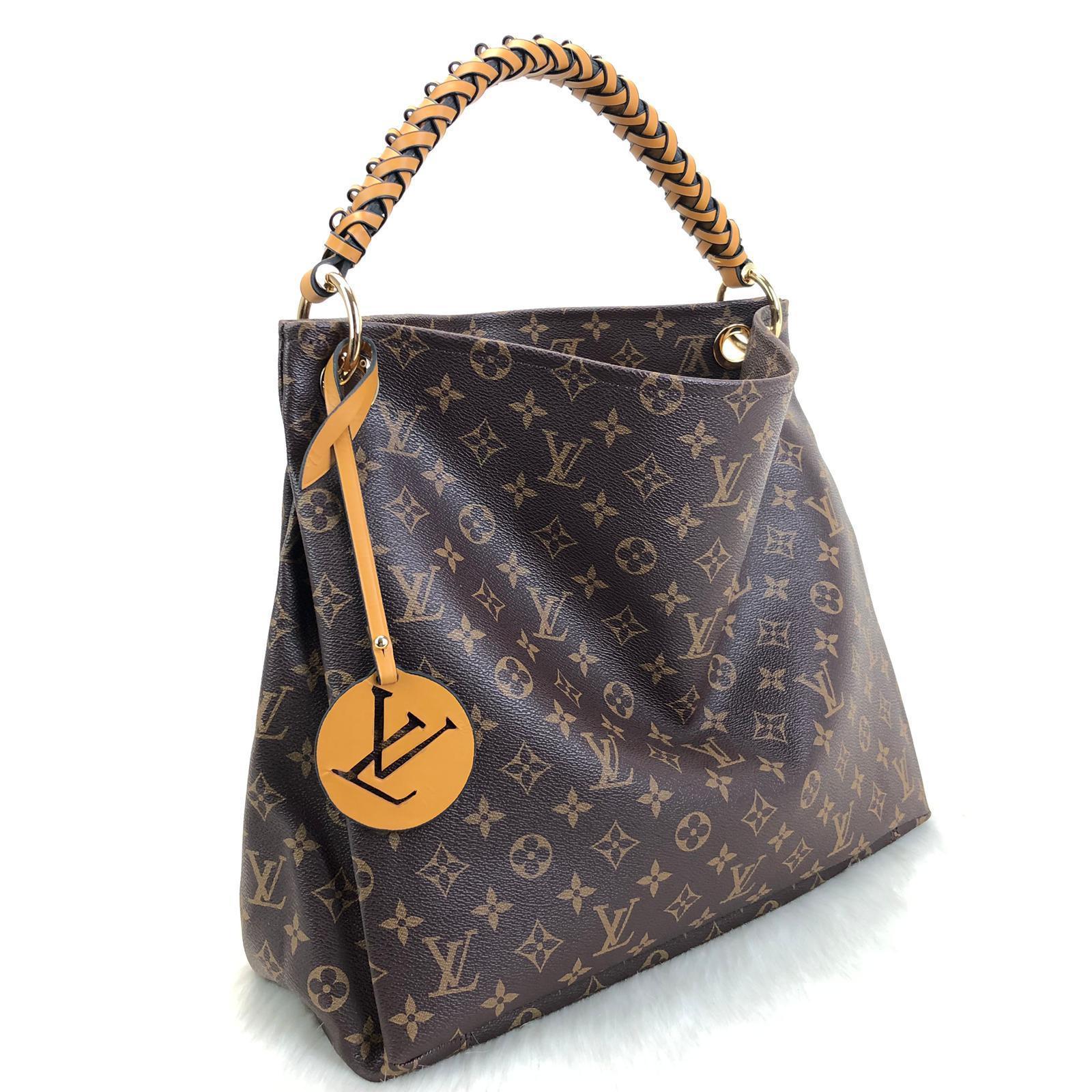 Louis Vuitton Graceful Vs. Artsy: A Battle Of The Best Hobo Bags