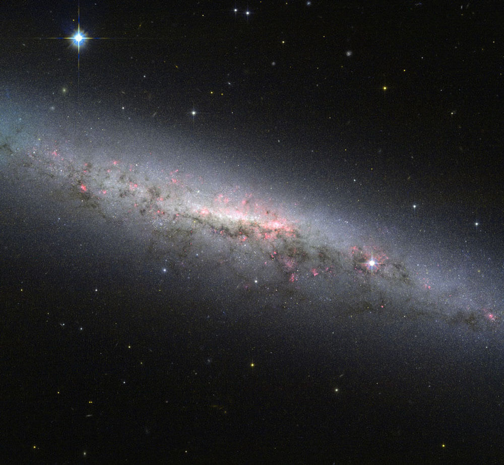 Barred spiral galaxy NGC 7090