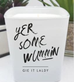white gloss glass jar candle with black text that reads 'yer some wummin'