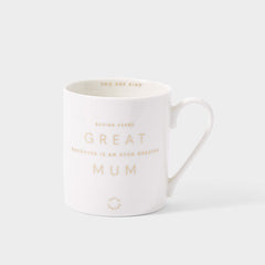 white mug with gold metallic text that reads 'behind every great daughter is an even greater mum'