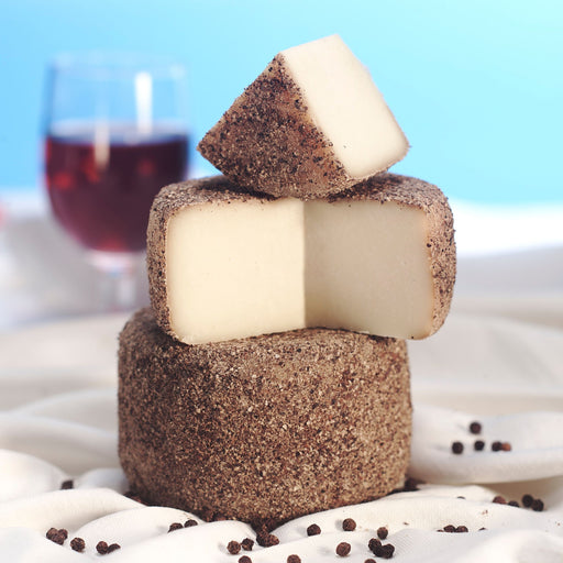 Buy Wheels of Pecorino Al Tartufo Cheese from Italy in Bulk Online