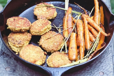 falafels on a skillet with cooked carrots