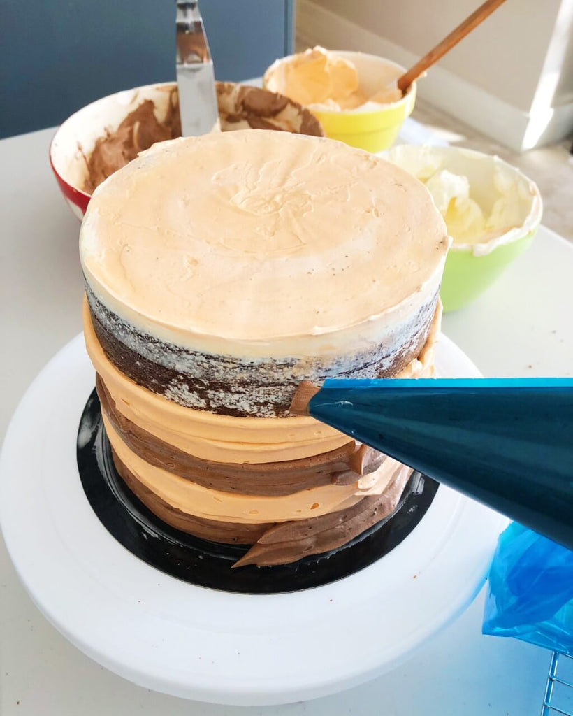 Chocolate Orange Drip Cake Recipe - top buttercream stripes